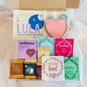 Small care box with various chocolates and nice products to send a little love