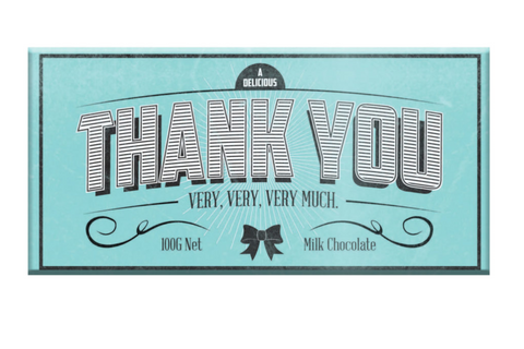 Chocolate bar packaging with 'Thank You Very, Very, Very Much' text on a light blue background