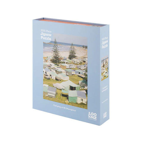 Jigsaw puzzle box with a scenic image of a campsite on the cover