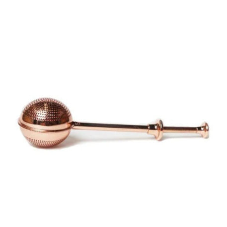 Copper tea infuser  on a white background