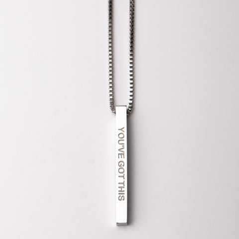  'YOU'VE GOTTHIS' engraving on a light gray background